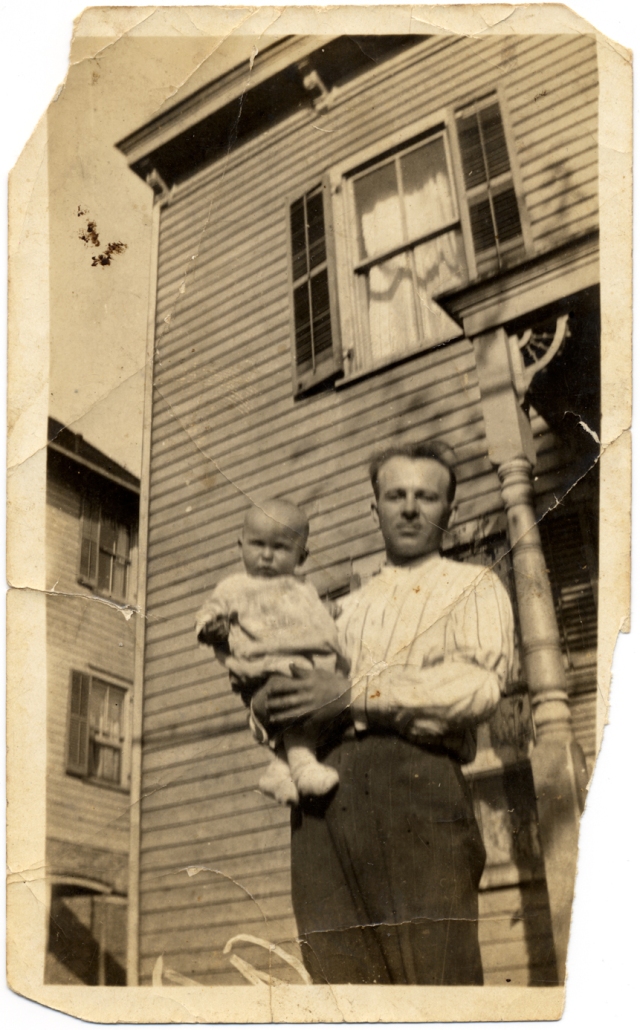 Photo of my grandfather Alex Kowal holding my father Anton. Taken in front of their new home at 4658 Arthur Kill Road, probably in the spring of 1919. Click to enlarge.